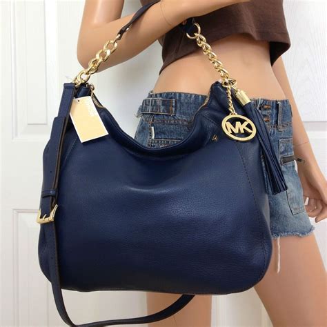 michael kors navy shoulder purse.